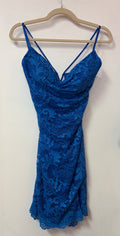 La Femme Royal Blue Lace Homecoming Dress with Cowl Neckline and Strappy Back Detail