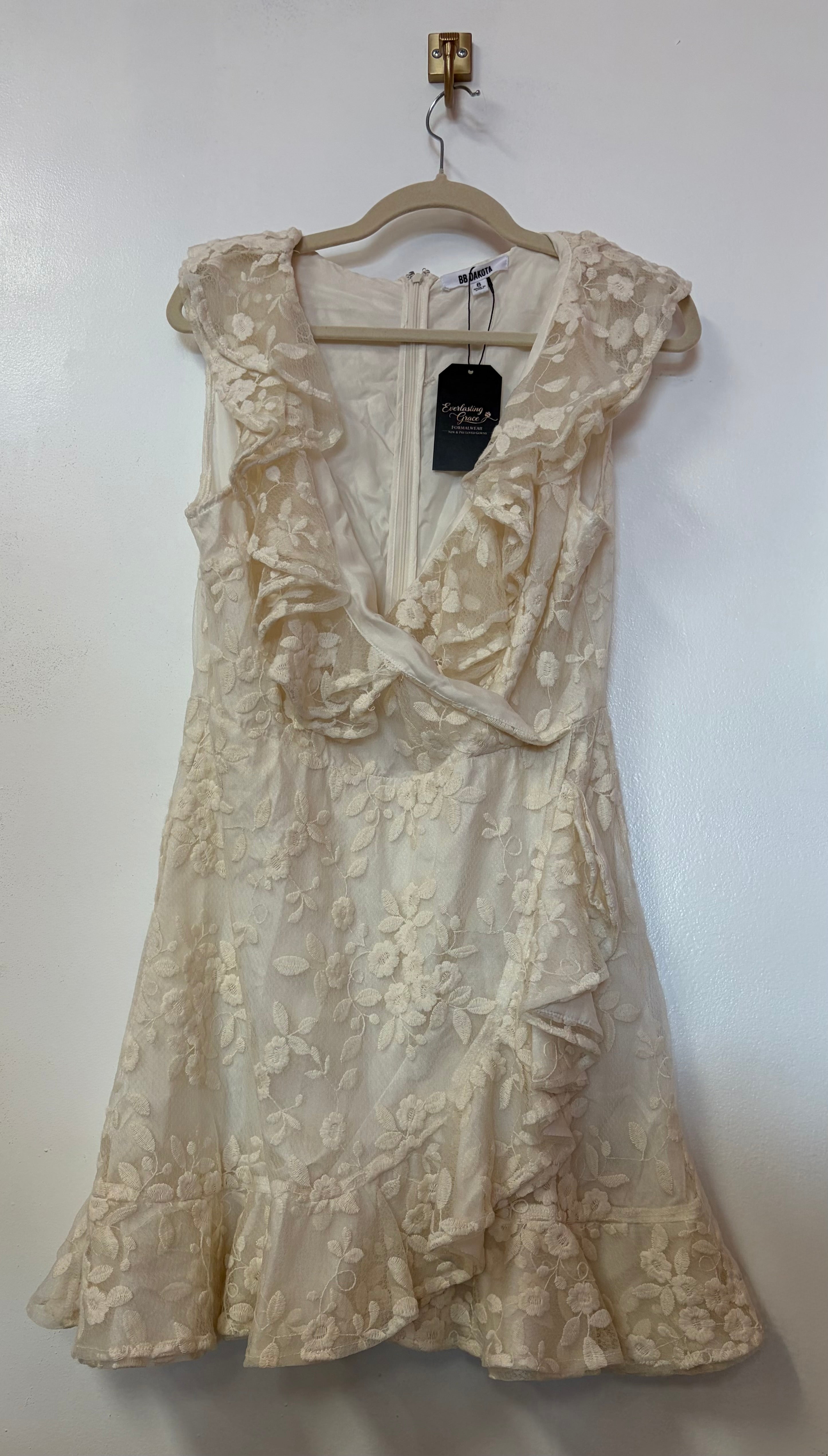 BB Dakota Cream Floral Lace Ruffle Wrap Dress with Cascading Ruffle Detail