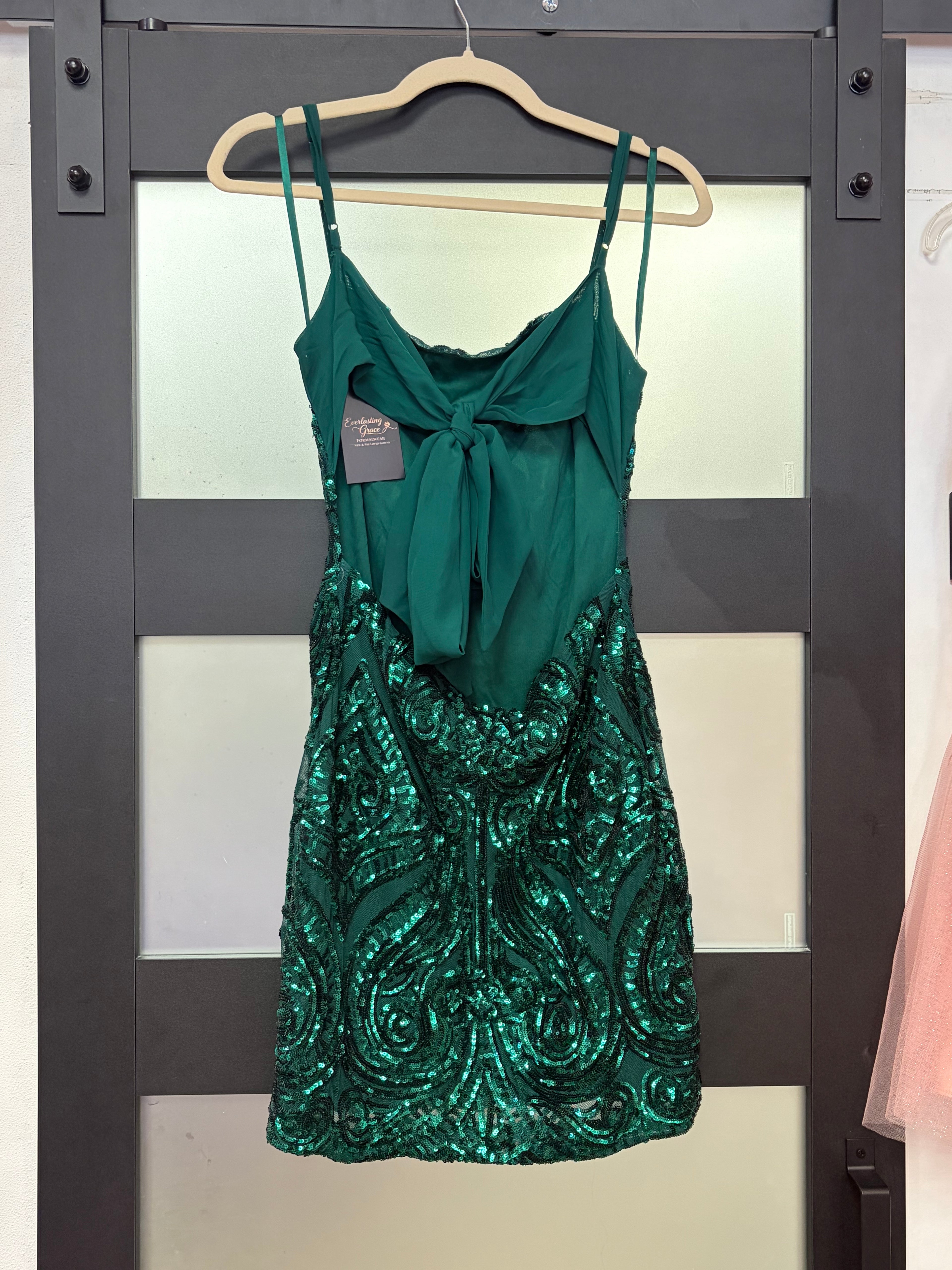 B Darlin Emerald Green Sequin Homecoming Dress with Open Back Bow Detail