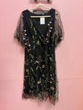 Black mid length dress with floral print