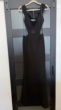 Faviana style 7988 black gown with side cutouts, zipper detail down back