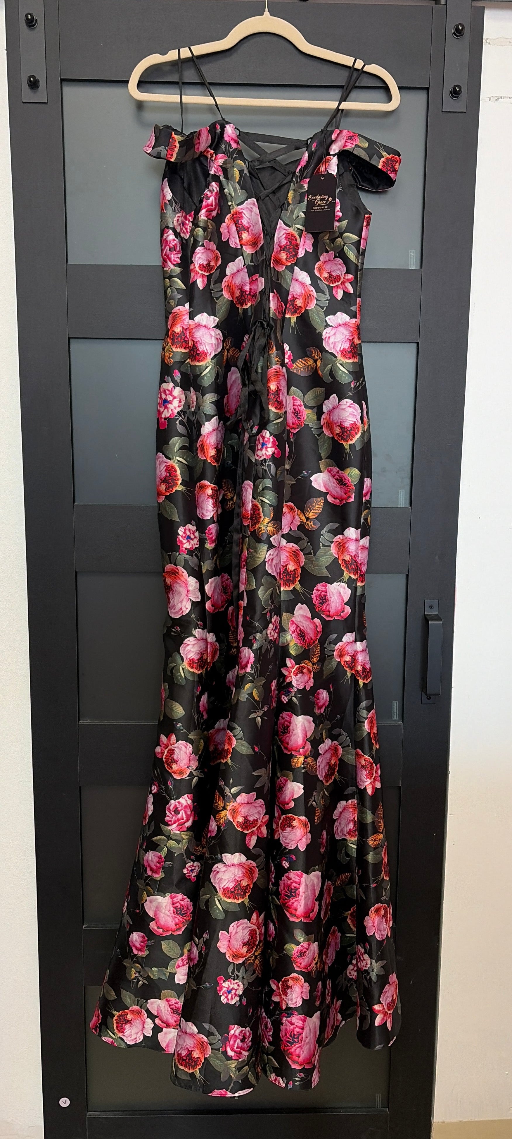 Black off the shoulder La Femme mermaid style gown with floral detail and lace up back