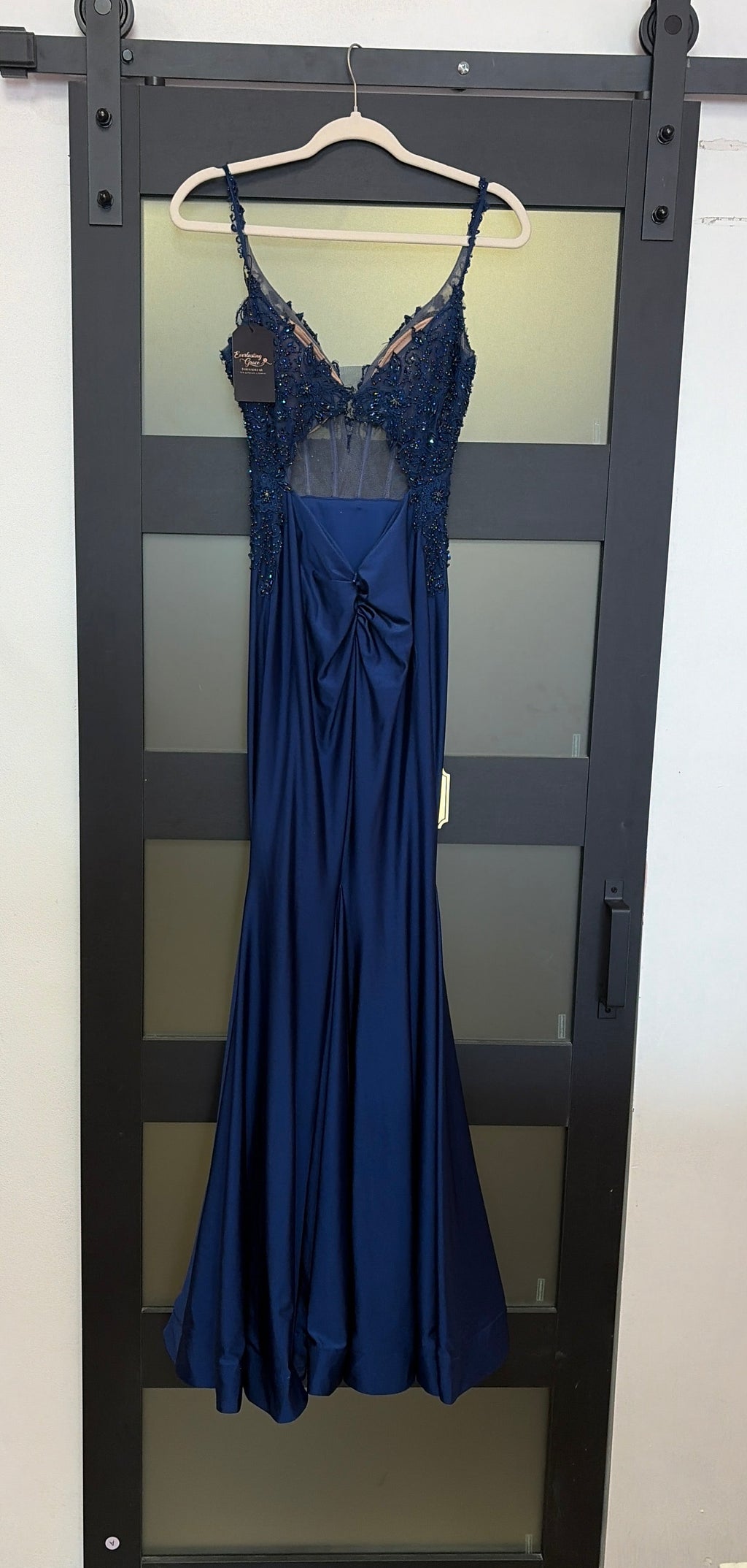 Ellie Wilde style EW120007 navy blue gown with beautiful detailing on top