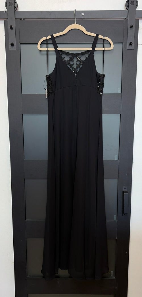Black flowy Faviana gown with beaded bust detailing