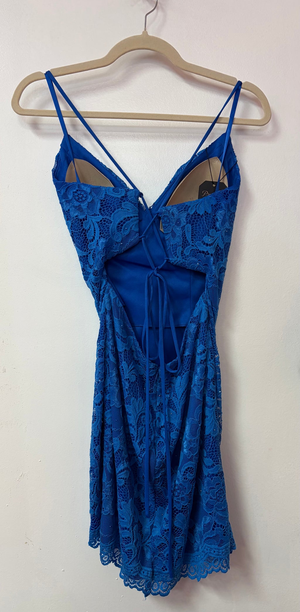 La Femme Royal Blue Lace Homecoming Dress with Cowl Neckline and Strappy Back Detail