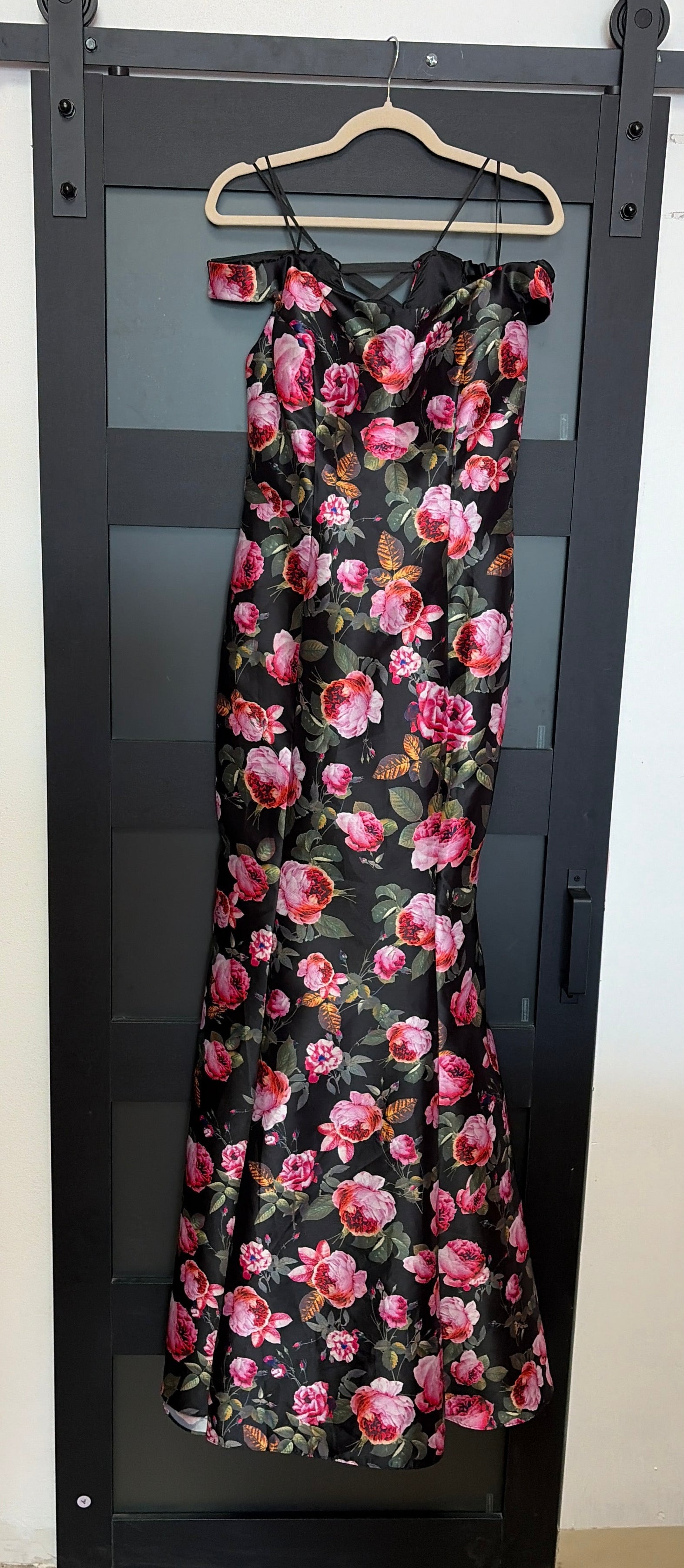 Black off the shoulder La Femme mermaid style gown with floral detail and lace up back